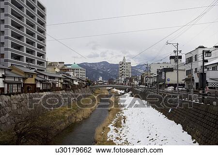 Stock Image - Cityscape with stream. Fotosearch