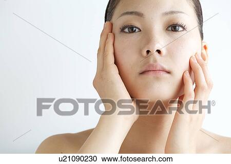 Stock Image - Close-Up of Young Woman. Fotosearch