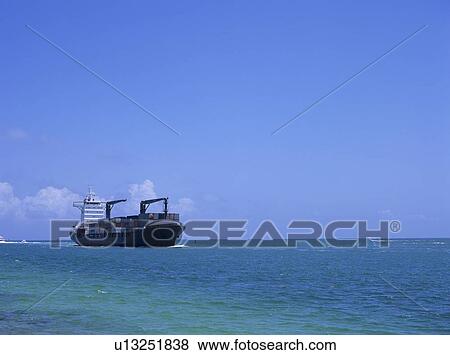 Container ship on sea, Florida, USA View Large Photo Image Stock Photo - Container ship on sea, Florida, USA. Fotosearch