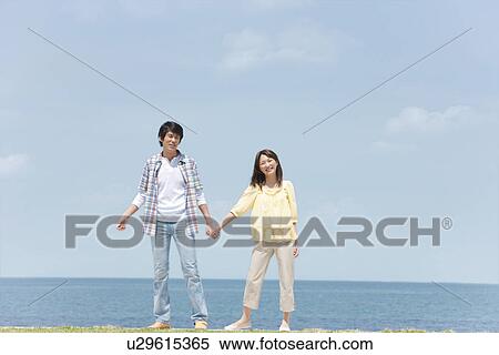 Stock Photography - Couple Holding Hands. Fotosearch