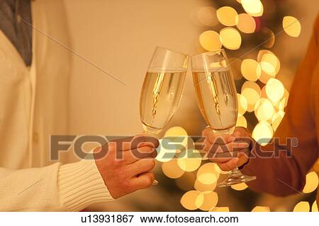Couple Toasting With Champagne View Large Photo Image Stock Photo - Couple Toasting With Champagne. Fotosearch
