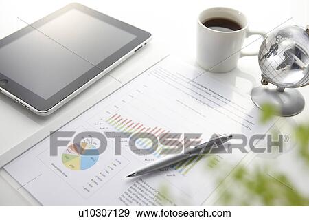 Digital Tablet, Graph, Pen and Coffee on Desk View Large Photo Image Stock Photo - Digital Tablet, Graph, Pen and Coffee on Desk. Fotosearch