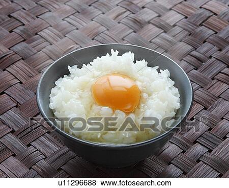 Egg on rice View Large Photo Image Stock Photo - Egg on rice. Fotosearch