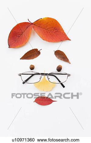 Face Made Out of Leaves and Glasses View Large Photo Image Stock Image - Face Made Out of Leaves and Glasses. Fotosearch