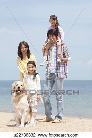 Family of Four and Dog on Beach View Large Photo Image Stock Image - Family of Four and Dog on Beach. Fotosearch