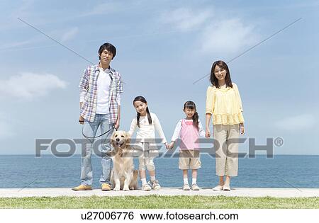 Family of Four and Dog on Beach View Large Photo Image Stock Photograph - Family of Four and Dog on Beach. Fotosearch