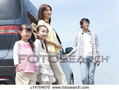 Family of Four By Car View Large Photo Image Stock Image - Family of Four By Car. Fotosearch