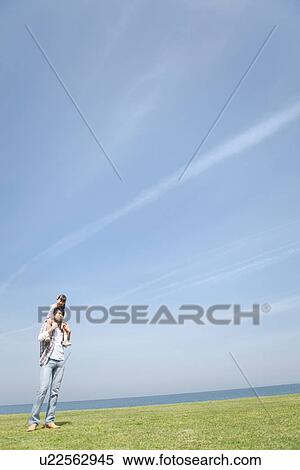 Father Carrying Daughter on Shoulders View Large Photo Image Stock Photography - Father Carrying Daughter on Shoulders. Fotosearch