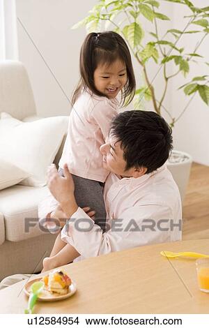 Father hugging daughter View Large Photo Image Picture - Father hugging daughter. Fotosearch