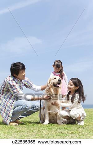 Father, Two Daughters and Dog on Grass View Large Photo Image Stock Photography - Father, Two Daughters and Dog on Grass. Fotosearch