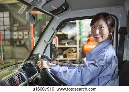 Female Car Mechanic In Car View Large Photo Image Stock Image - Female Car Mechanic In Car. Fotosearch