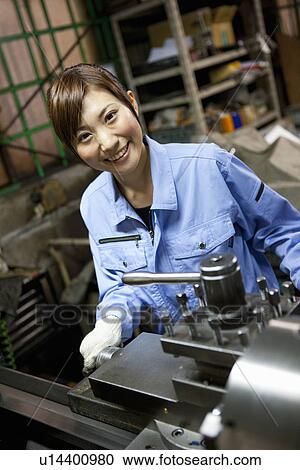 Female Factory Worker Operating Machine View Large Photo Image Stock Image - Female Factory Worker Operating Machine. Fotosearch