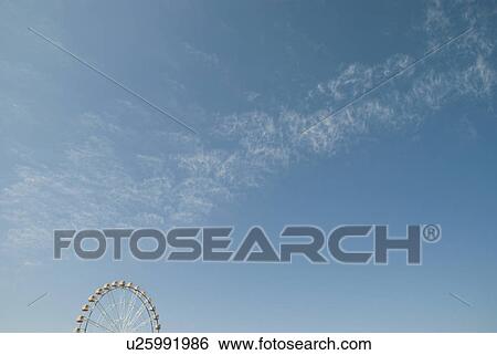 Ferris Wheel and Blue Sky View Large Photo Image Stock Photograph - Ferris Wheel and Blue Sky. Fotosearch