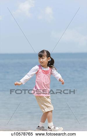 Stock Photography - Girl on Beach. Fotosearch