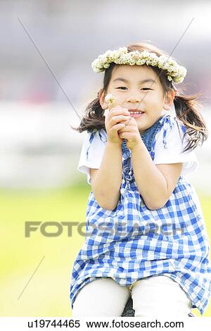 Stock Photography - Girl Wearing Wreath. Fotosearch