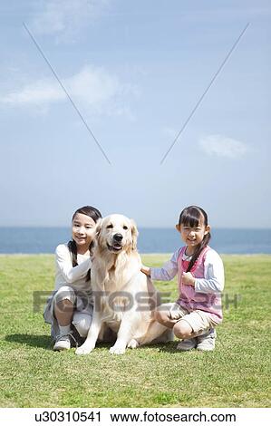 Girls and Dog on Lawn View Large Photo Image Stock Image - Girls and Dog on Lawn. Fotosearch