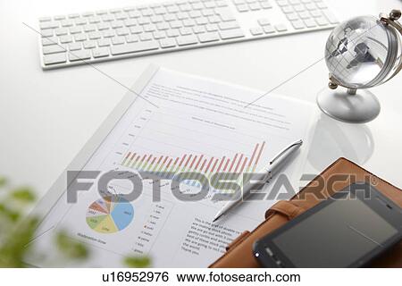 Graph and Personal Accessories on Desk View Large Photo Image Stock Photograph - Graph and Personal Accessories on Desk. Fotosearch