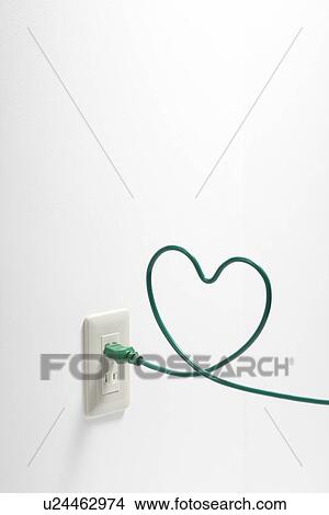 Picture - Green Plug In Heart Shape. Fotosearch