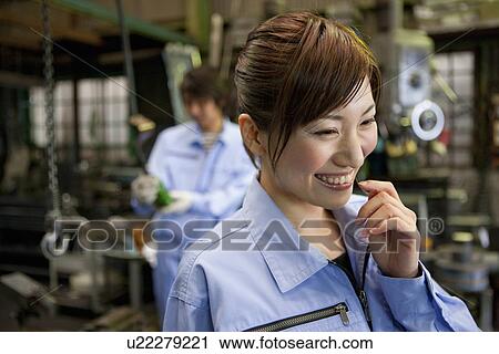 Happy Female Factory Worker View Large Photo Image Stock Image - Happy Female Factory Worker. Fotosearch