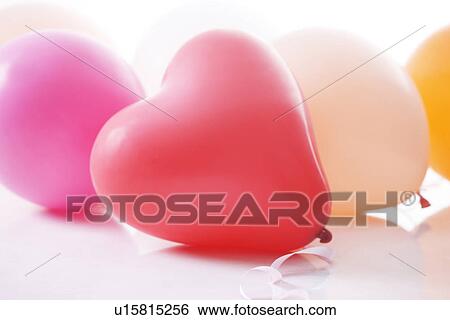 Heart shaped balloons View Large Photo Image Stock Photograph - Heart shaped balloons. Fotosearch