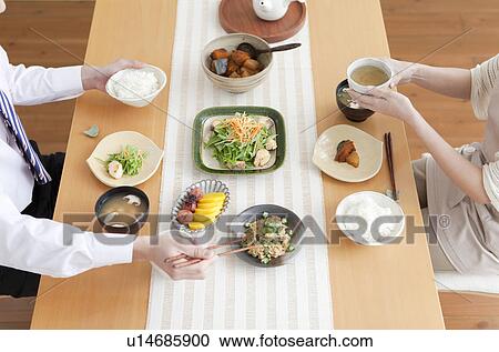 High Angle View of Couple Having Breakfast View Large Photo Image Stock Image - High Angle View of Couple Having Breakfast. Fotosearch