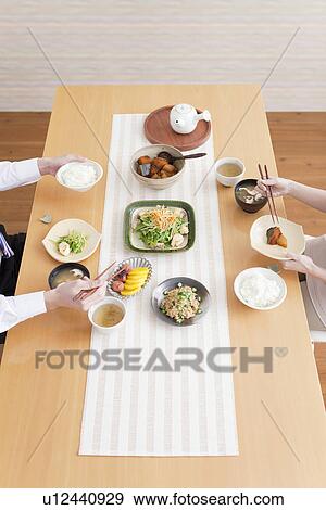 High Angle View of Couple Having Breakfast View Large Photo Image Stock Photo - High Angle View of Couple Having Breakfast. Fotosearch