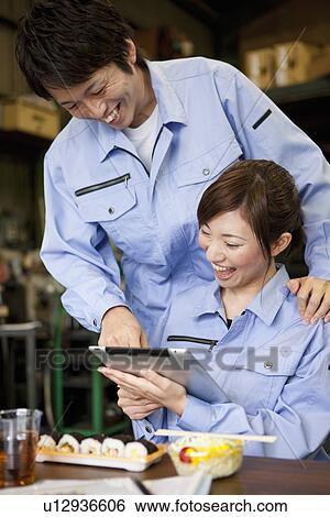 Male and Female Worker Having Lunch Break View Large Photo Image Stock Photograph - Male and Female Worker Having Lunch Break. Fotosearch