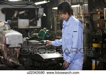 Male Factory Worker Using Machine View Large Photo Image Stock Image - Male Factory Worker Using Machine. Fotosearch