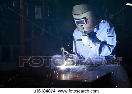 Picture - Man Welding. Fotosearch