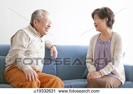 Mature Couple In Living Room View Large Photo Image Stock Image - Mature Couple In Living Room. Fotosearch