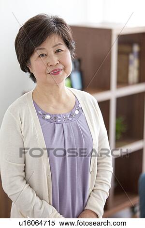 Mature Woman In Living Room View Large Photo Image Stock Photography - Mature Woman In Living Room. Fotosearch