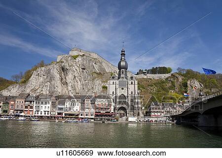 Stock Photo - Meuse River and Collegiate Church of Notre-Dame (Collegiale Notre-Dame). Fotosearch