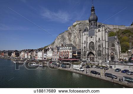 Stock Photo - Meuse River and Collegiate Church of Notre-Dame (Collegiale Notre-Dame). Fotosearch