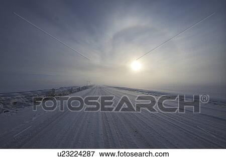 Stock Photo - Morning Sun Over Winter Landscape. Fotosearch