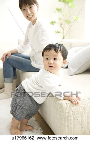 Stock Image - Mother and baby son. Fotosearch