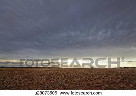 Overcast sky over field View Large Photo Image Stock Photograph - Overcast sky over field. Fotosearch