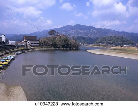 Stock Photo - Ozu castle and Hishi River, Ozu City, Ehime Prefecture, Japan. Fotosearch