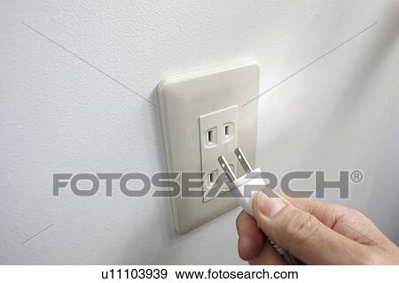 Person Plugging In View Large Photo Image Stock Photo - Person Plugging In. Fotosearch