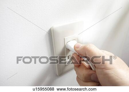 Person Plugging In View Large Photo Image Stock Photo - Person Plugging In. Fotosearch
