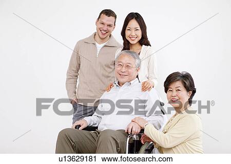 Portrait of Family, Mature Man In Wheelchair View Large Photo Image Stock Image - Portrait of Family, Mature Man In Wheelchair. Fotosearch