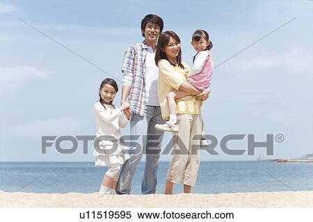 Portrait of Family of Four on Beach View Large Photo Image Stock Photography - Portrait of Family of Four on Beach. Fotosearch