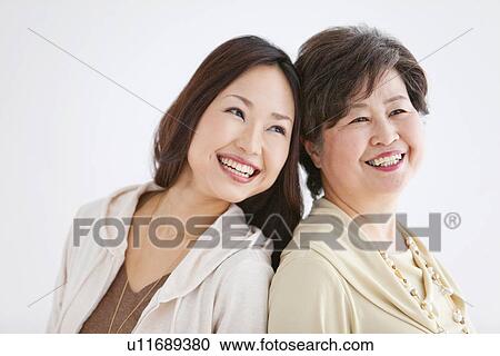 Stock Image - Portrait of Mother and Daughter. Fotosearch