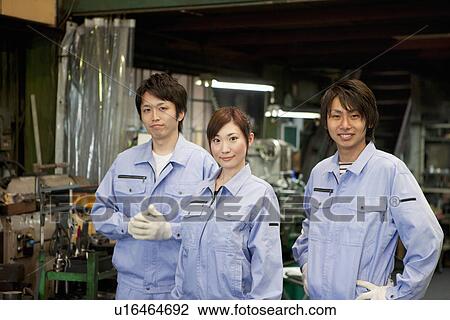 Portrait of Three Factory Workers View Large Photo Image Stock Image - Portrait of Three Factory Workers. Fotosearch