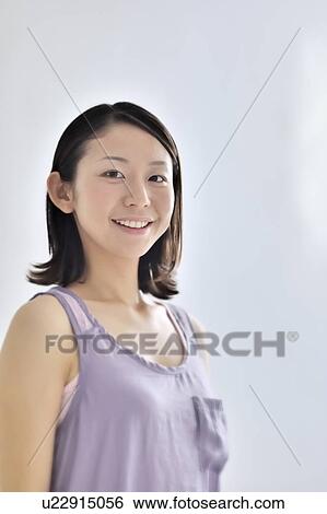 Stock Photograph - Portrait of young woman. Fotosearch