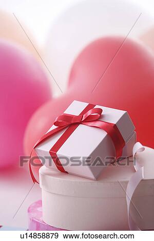 Presents and balloons View Large Photo Image Stock Photo - Presents and balloons. Fotosearch