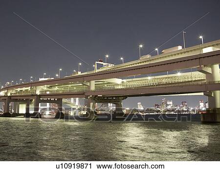 Stock Image - Rainbow Bridge - Tokyo, Japan. Fotosearch