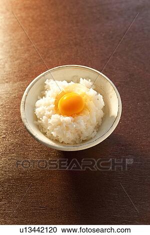 Raw Egg on Boiled Rice View Large Photo Image Stock Image - Raw Egg on Boiled Rice. Fotosearch