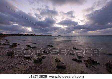 Stock Photo - Sea at dusk. Fotosearch