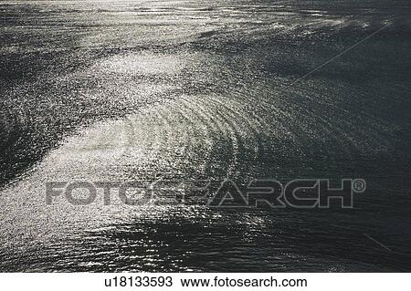 Stock Image - Shining Surface of Sea . Fotosearch