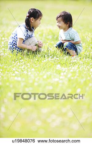 Sister and Brother Talking In Field View Large Photo Image Stock Photograph - Sister and Brother Talking In Field. Fotosearch